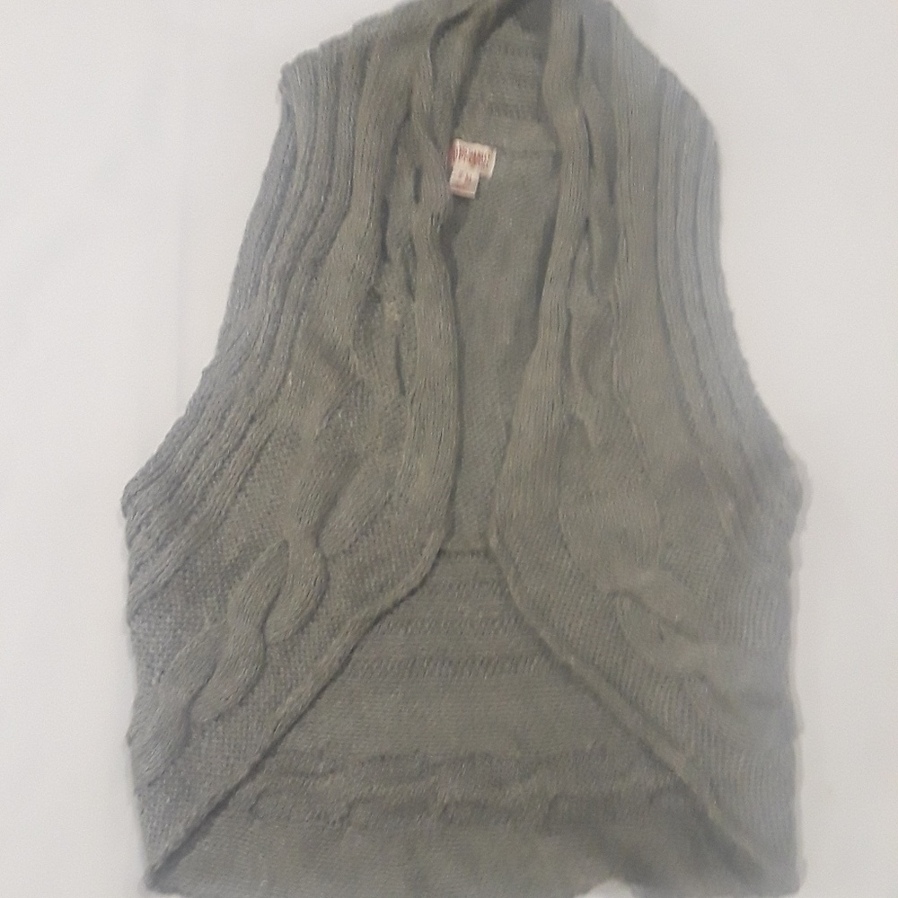 Gray sweater vest and pair of leg warmers